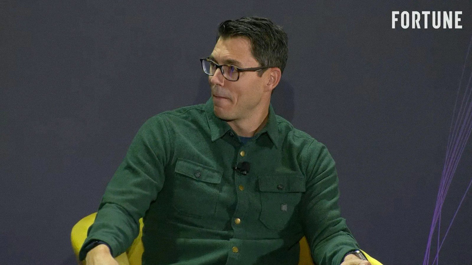 Rivian's founder and CEO RJ Scaringe speaking at a Fortune event