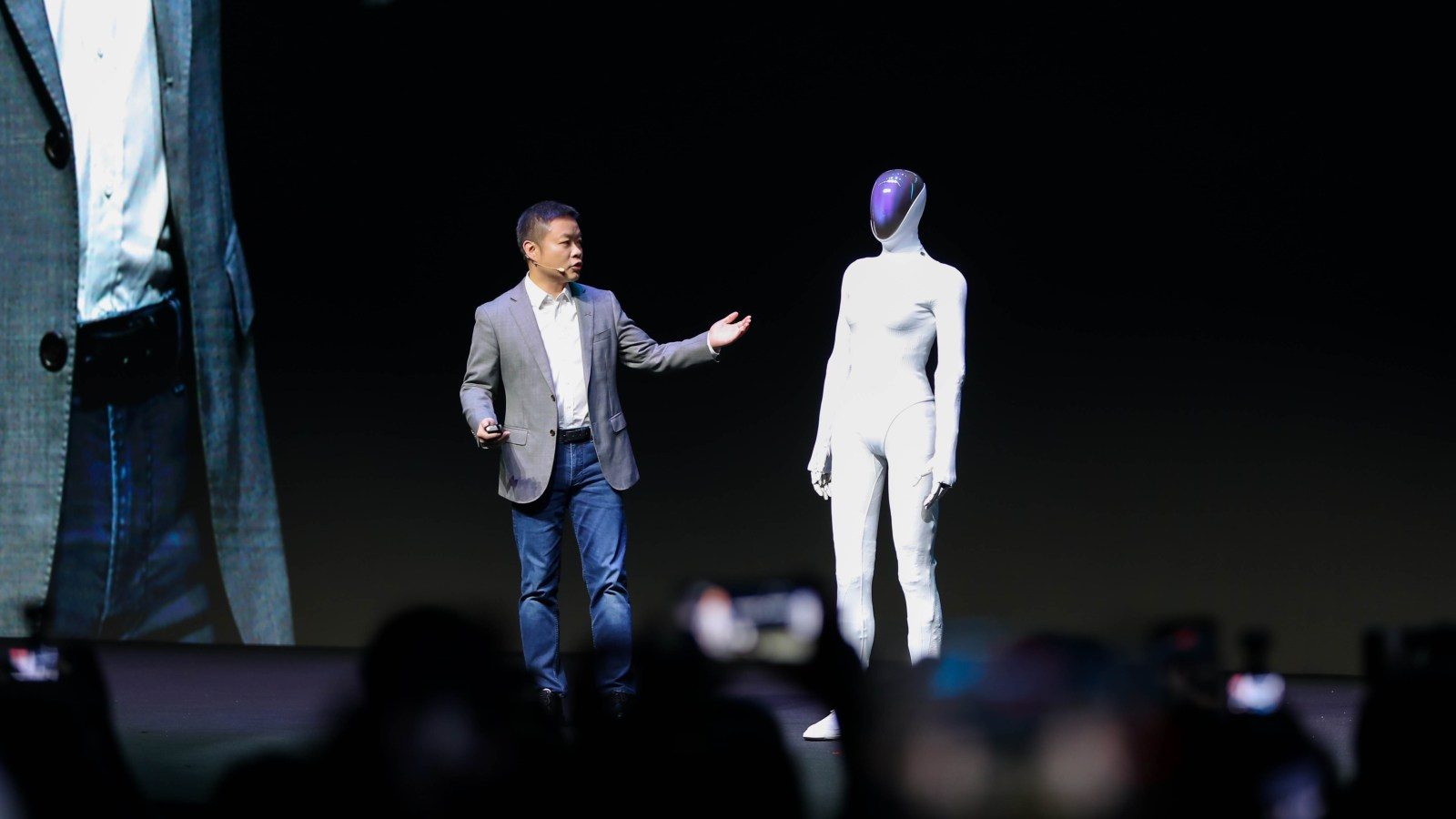 He Xiaopeng, XPeng's CEO, with the IRON Humanoid
