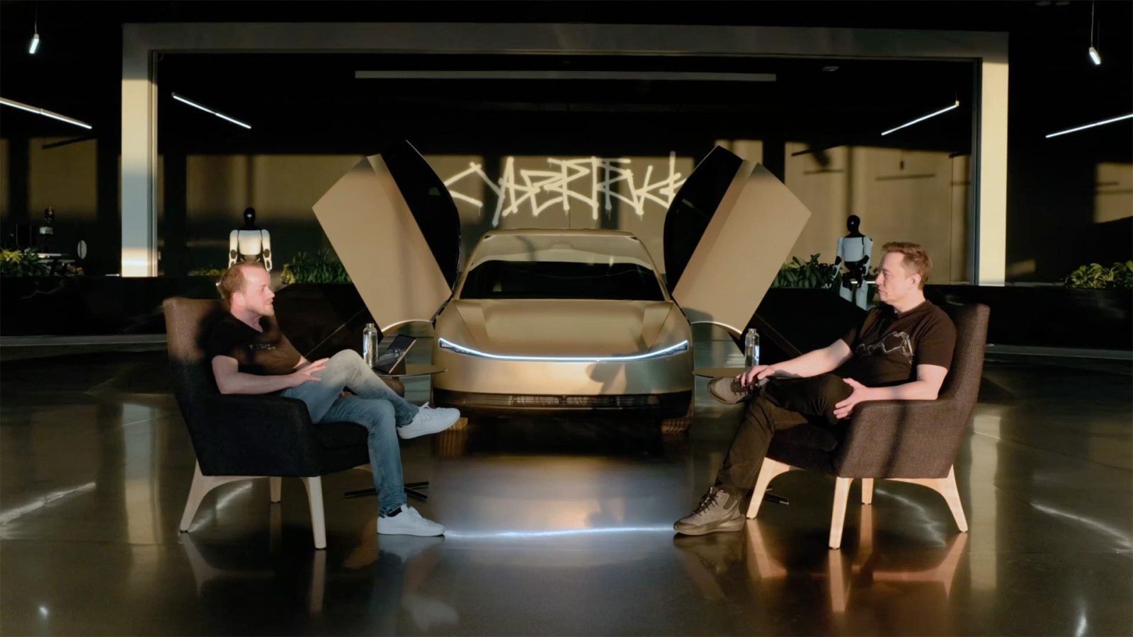 Tesla Andre Thierig and Elon Musk