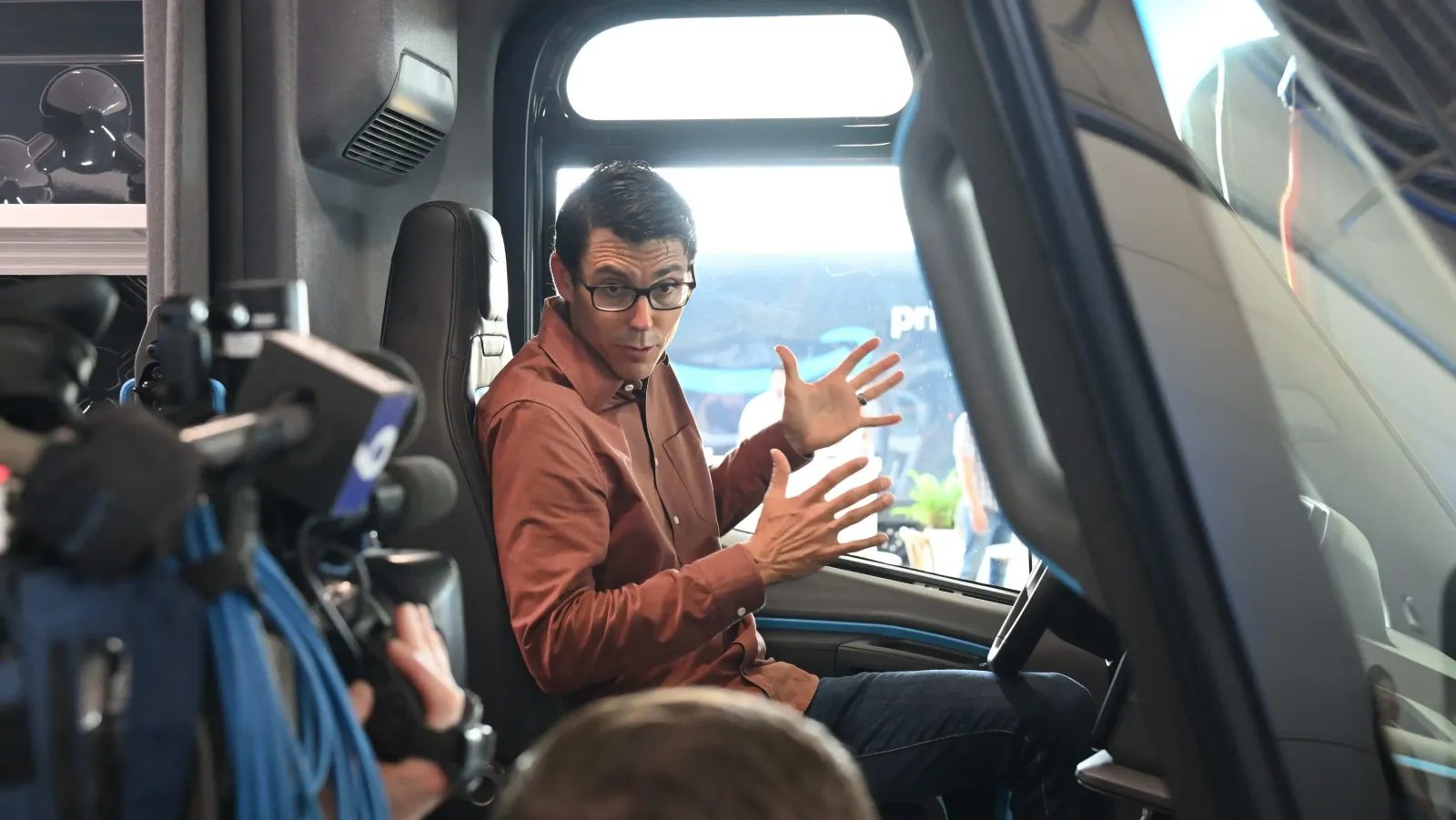 Rivian founder and CEO inside a van