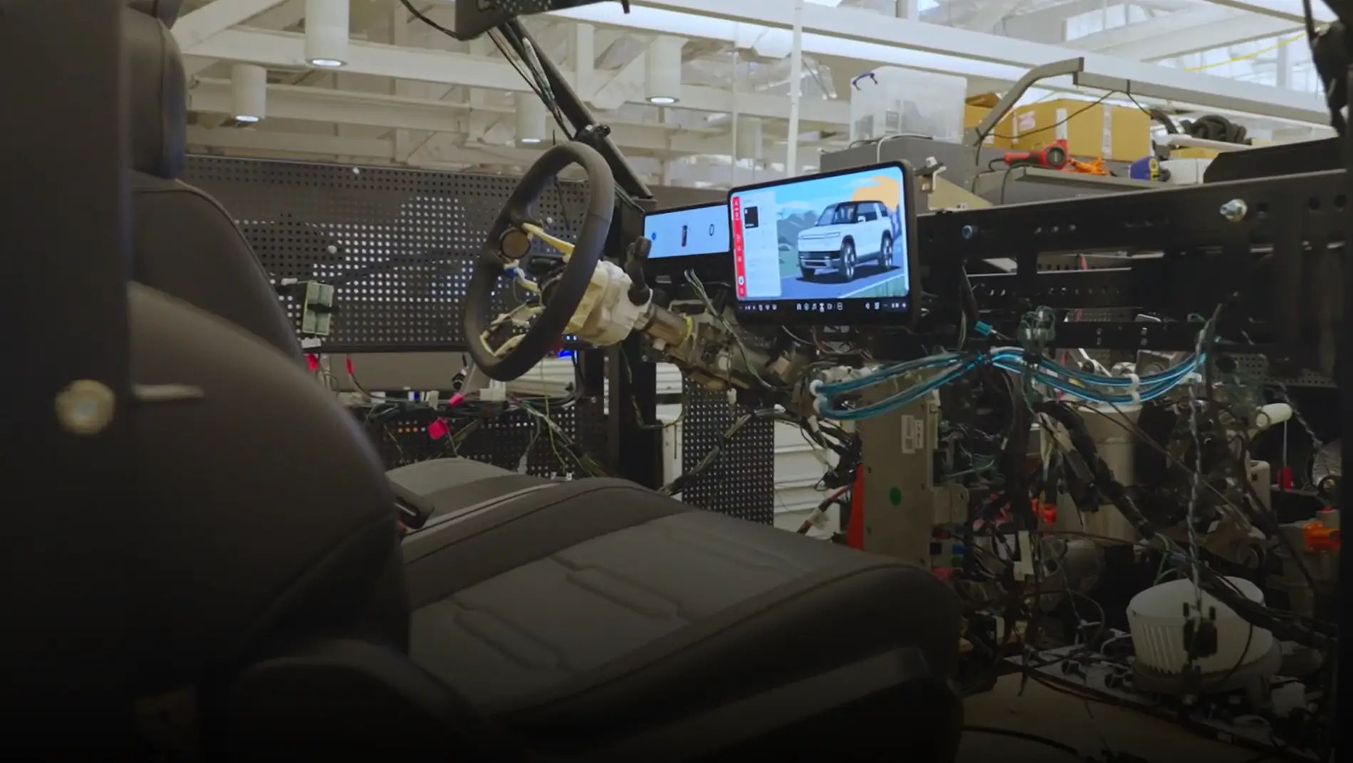 Rivian CEO Shows Off R2 SUV in Pre-Production Drive, Unveils New ...