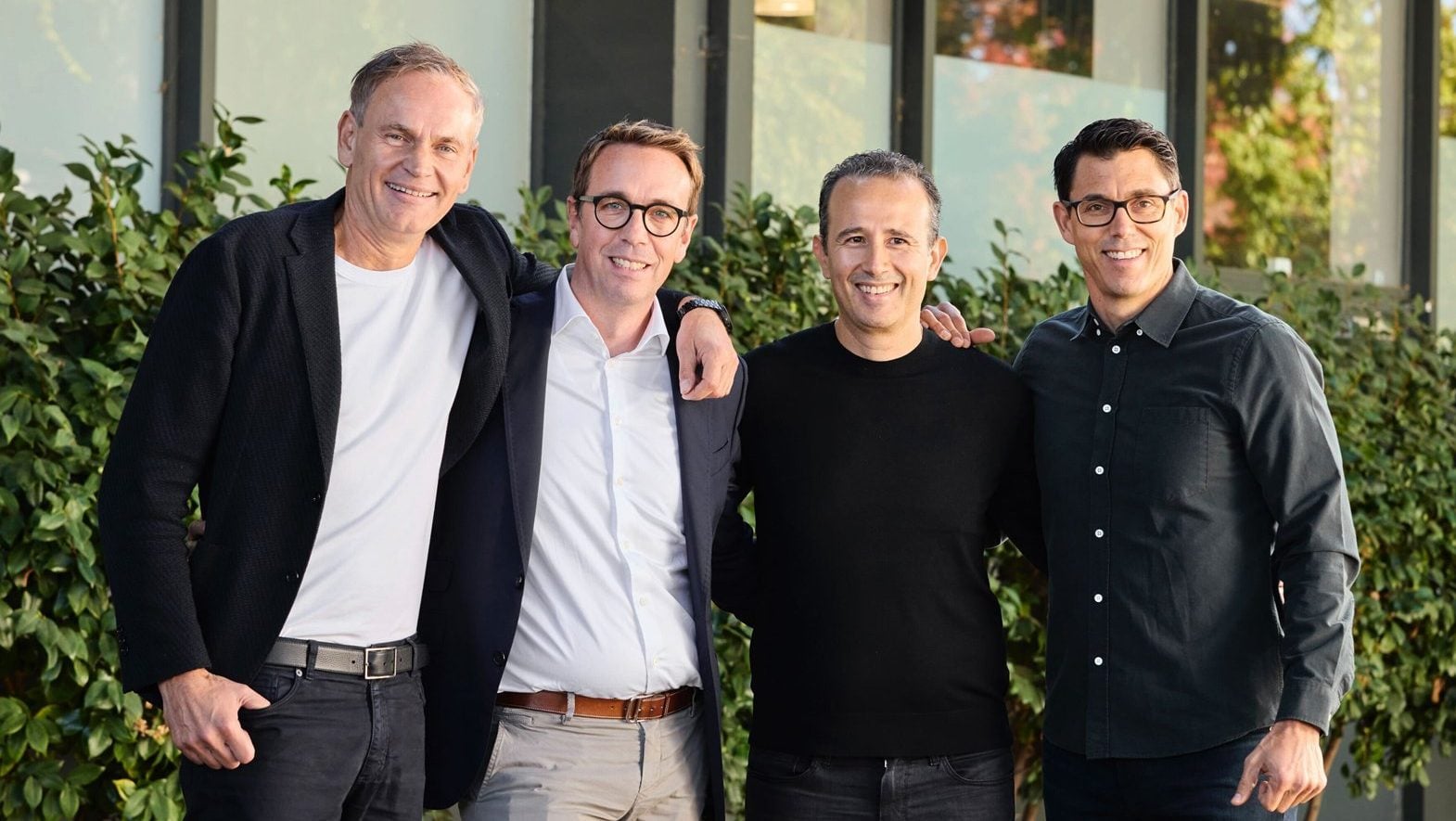 Rivian and Volkswagen chiefs