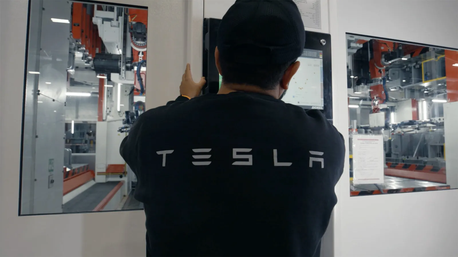 Tesla employee at a factory